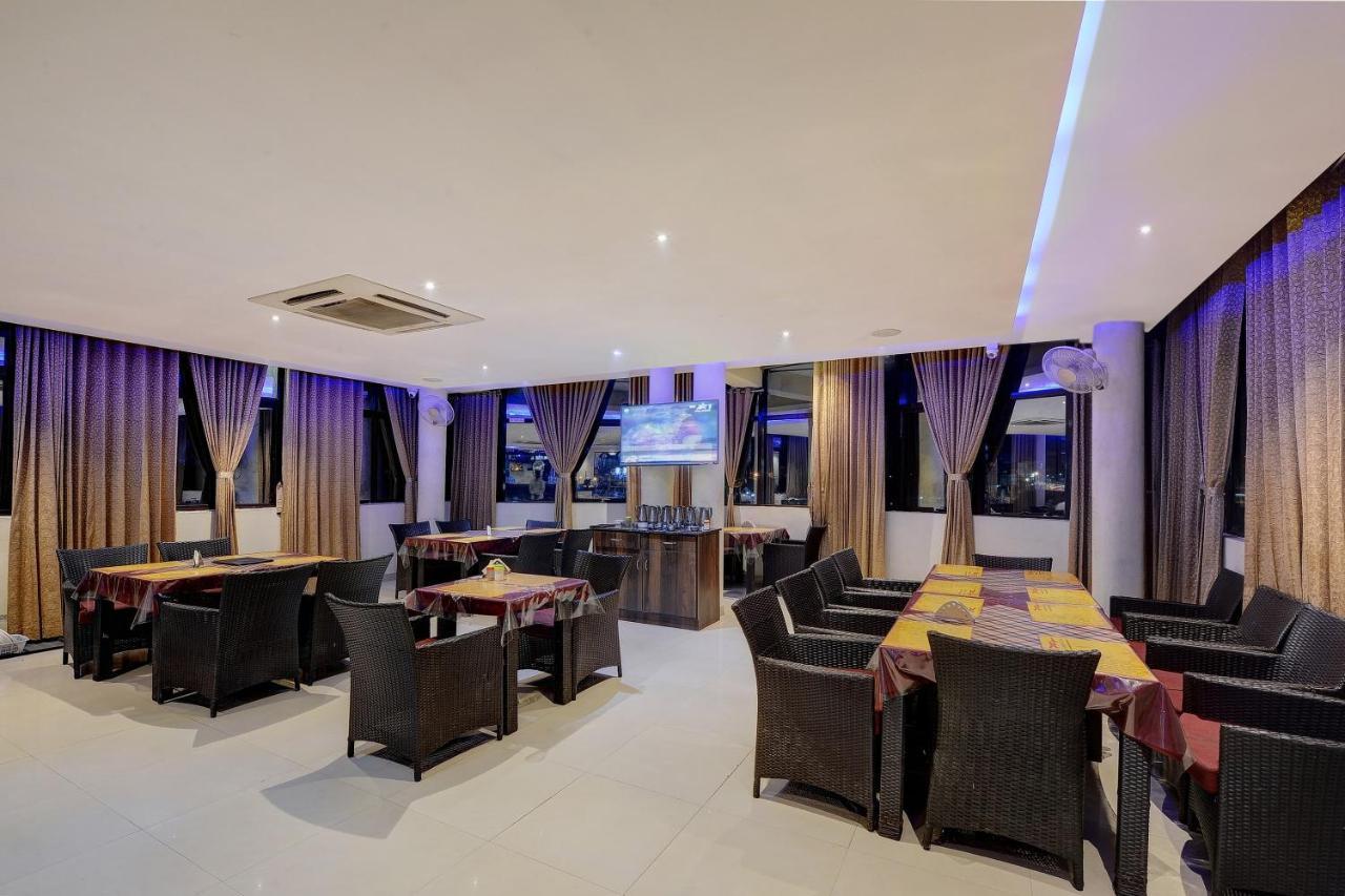 Capital O Hotel Samanvi International Belur  Buitenkant foto
